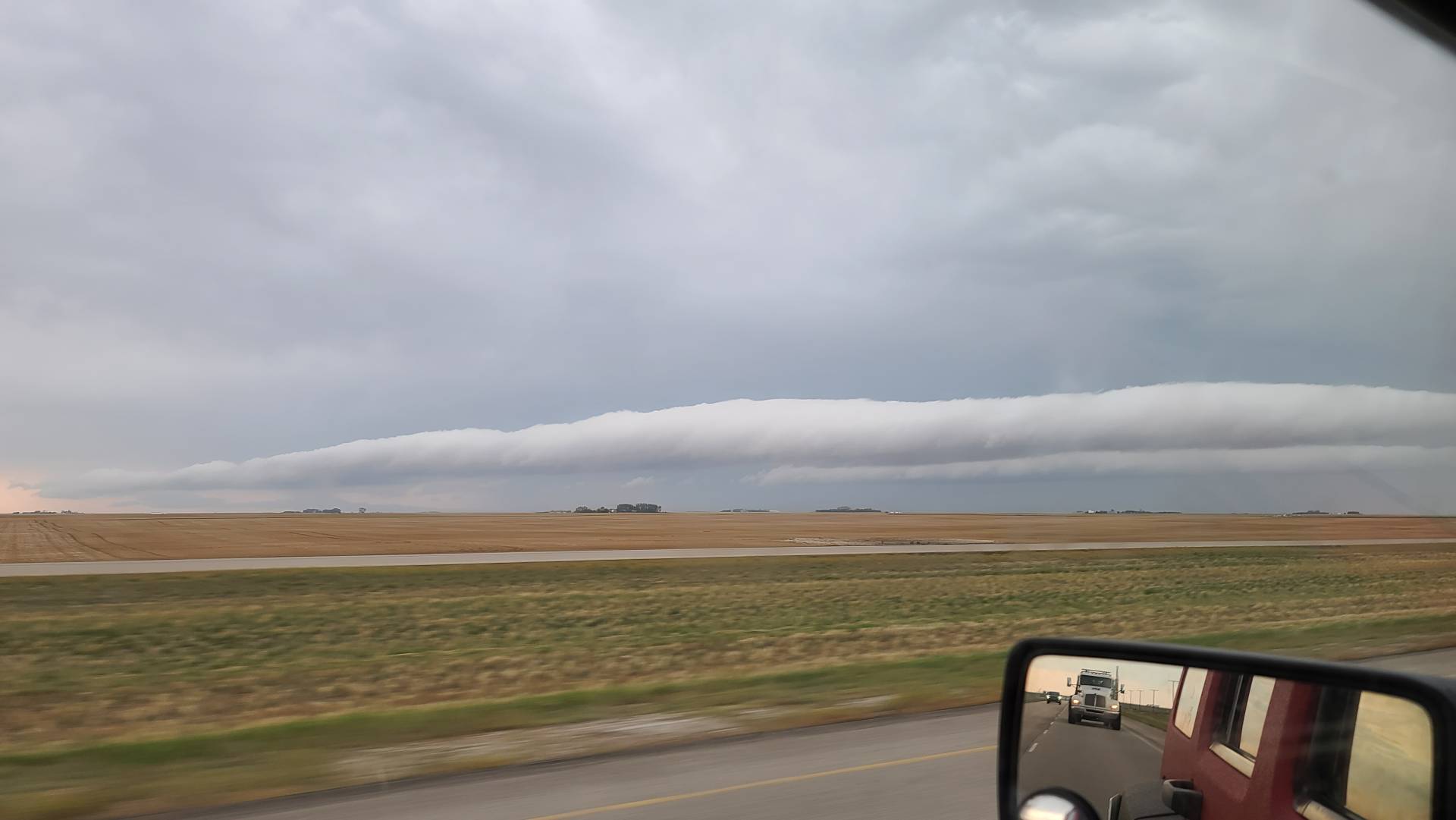 Big roll cloud pushing out ahead of Dying thunderstorm south of Regina, SK 10:40am #skstorm 