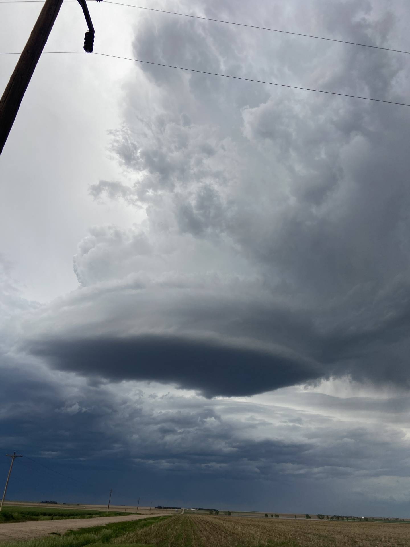 Wildly photogenic mini-supercell 06:51 PM