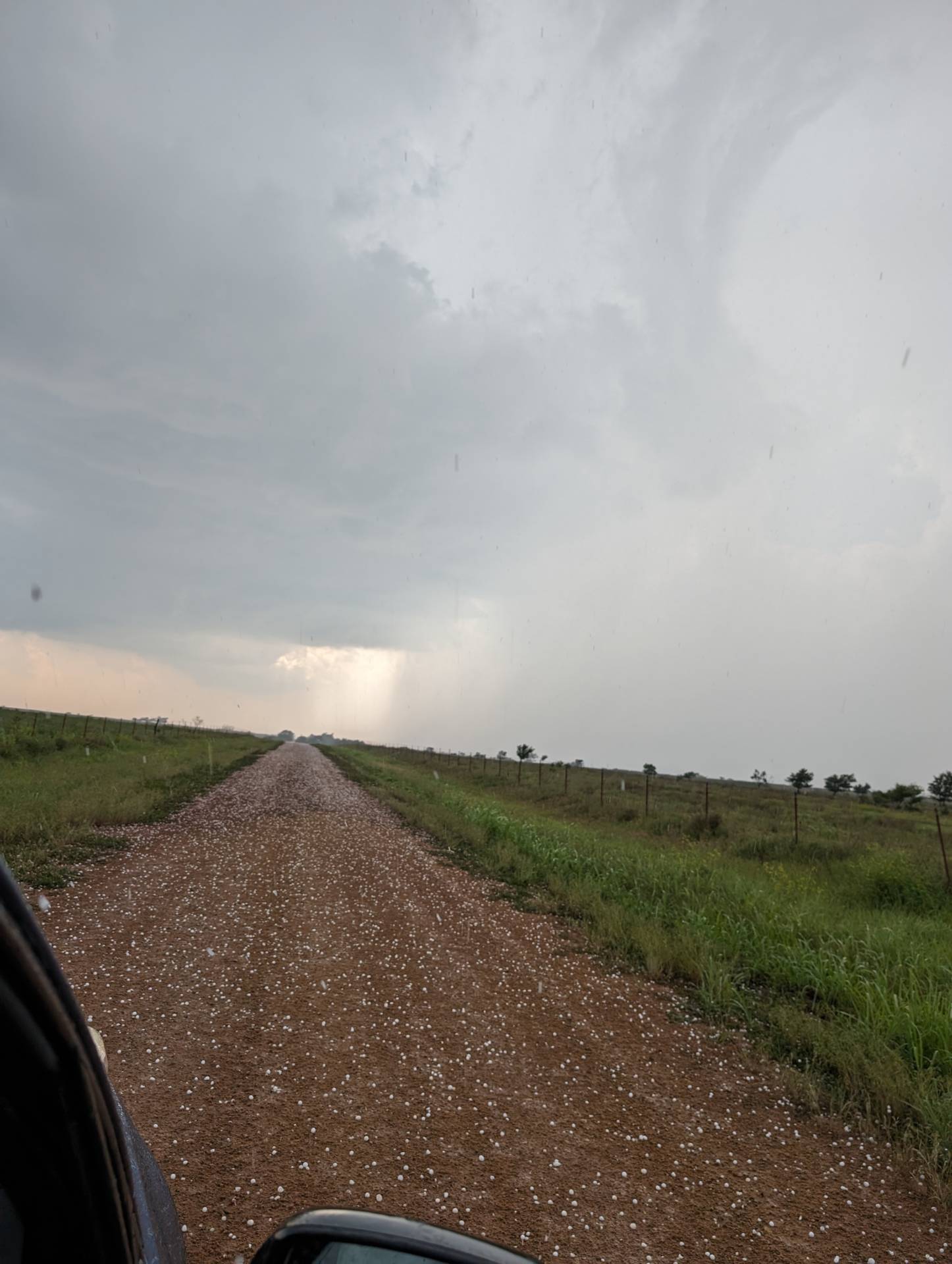 Quarter sized hail covering the road 3 south of Erick, OK. #okwx 05:05 PM @NWSNorman