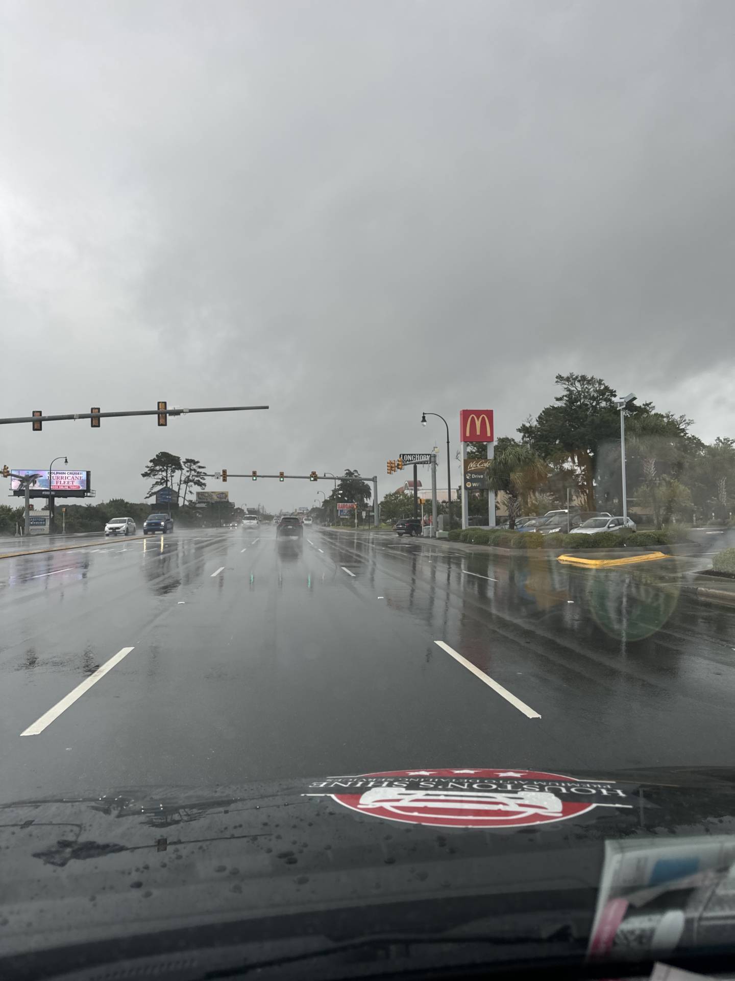 Bands of light rain and small gusts occurring in North Myrtle Beach as we head north towards Little River, SC